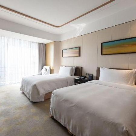 The Qube Hotel Jingzhou Экстерьер фото