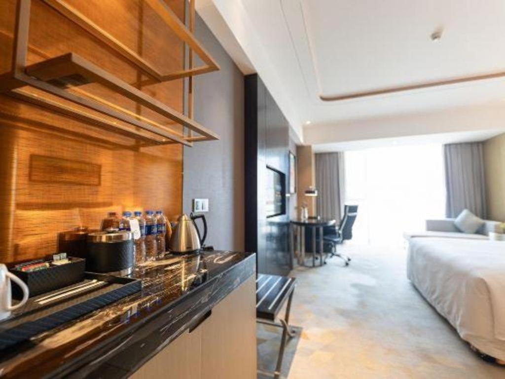 The Qube Hotel Jingzhou Экстерьер фото