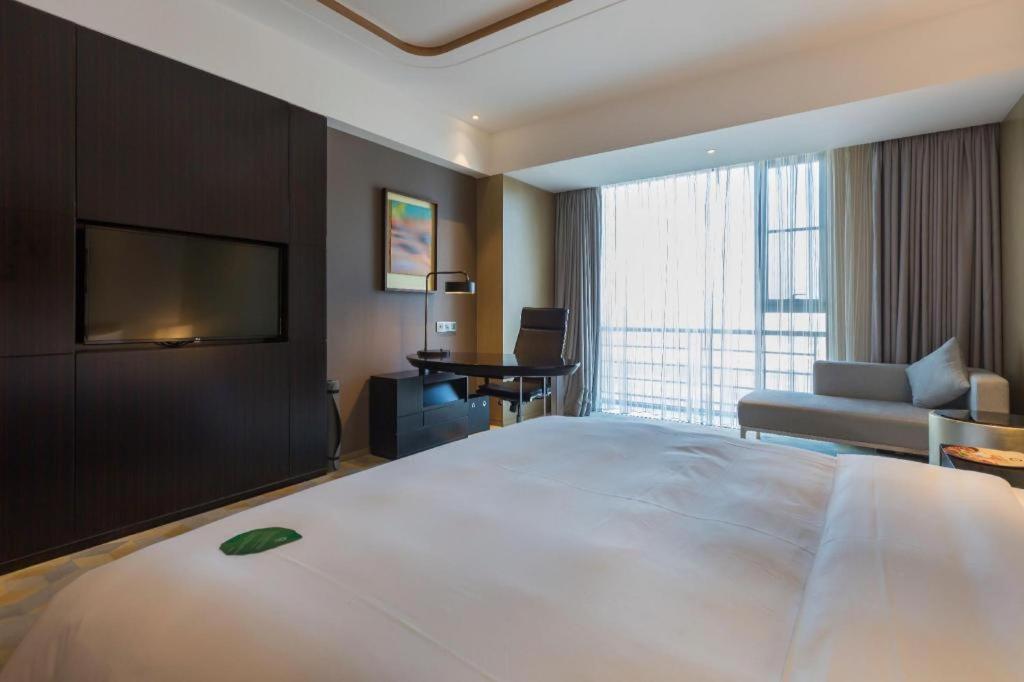 The Qube Hotel Jingzhou Экстерьер фото