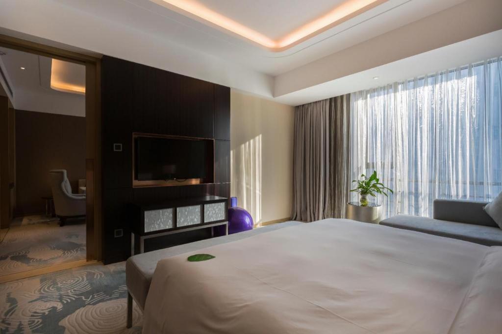 The Qube Hotel Jingzhou Экстерьер фото