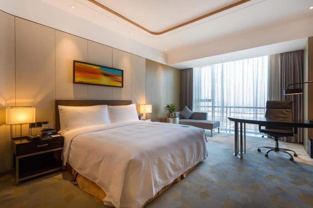 The Qube Hotel Jingzhou Экстерьер фото